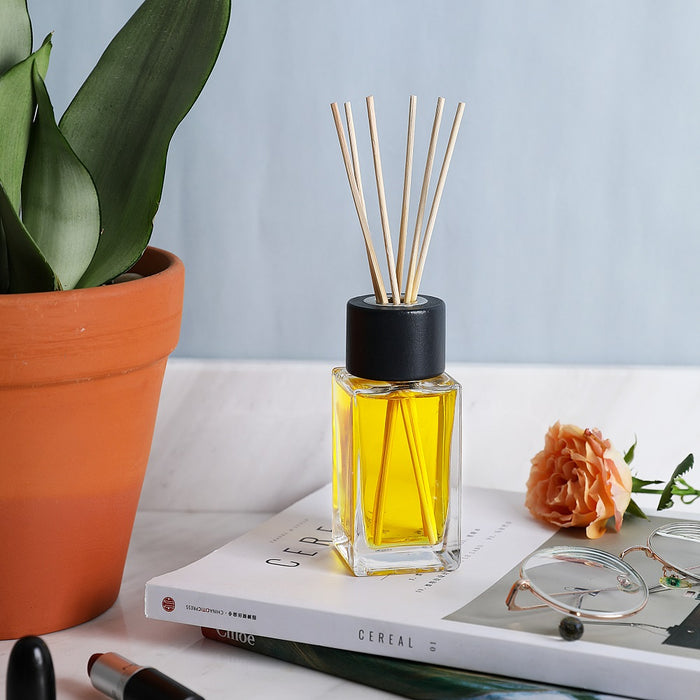 4.7” Tall Clear Square Glass Bottle Diffusers For Essential Oils with 24 pcs Black Reed Diffuser Sticks and  Black Wooden Caps, Set of 4 ( 3.4 oz ).
